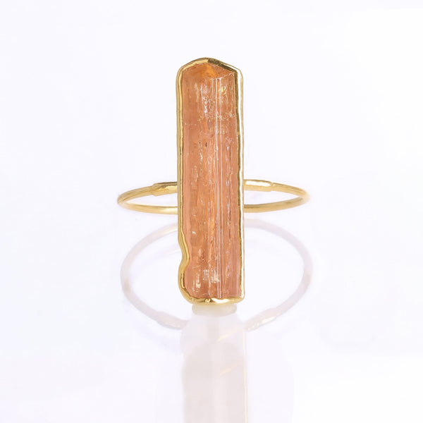 Raw Imperial Topaz Ring on a white background