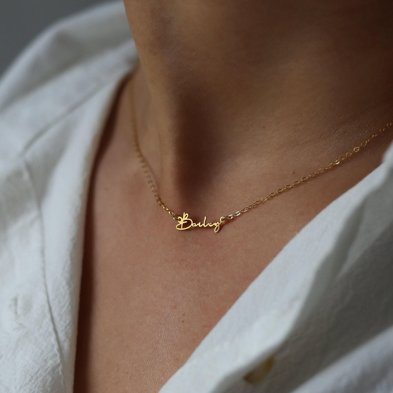 Fine gold cursive script name pendant on a dainty cable chain (2 of 18)