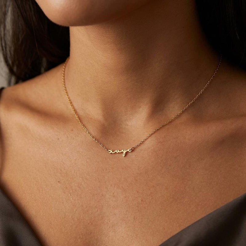 Fine gold cursive script name pendant on a dainty cable chain (3 of 18)