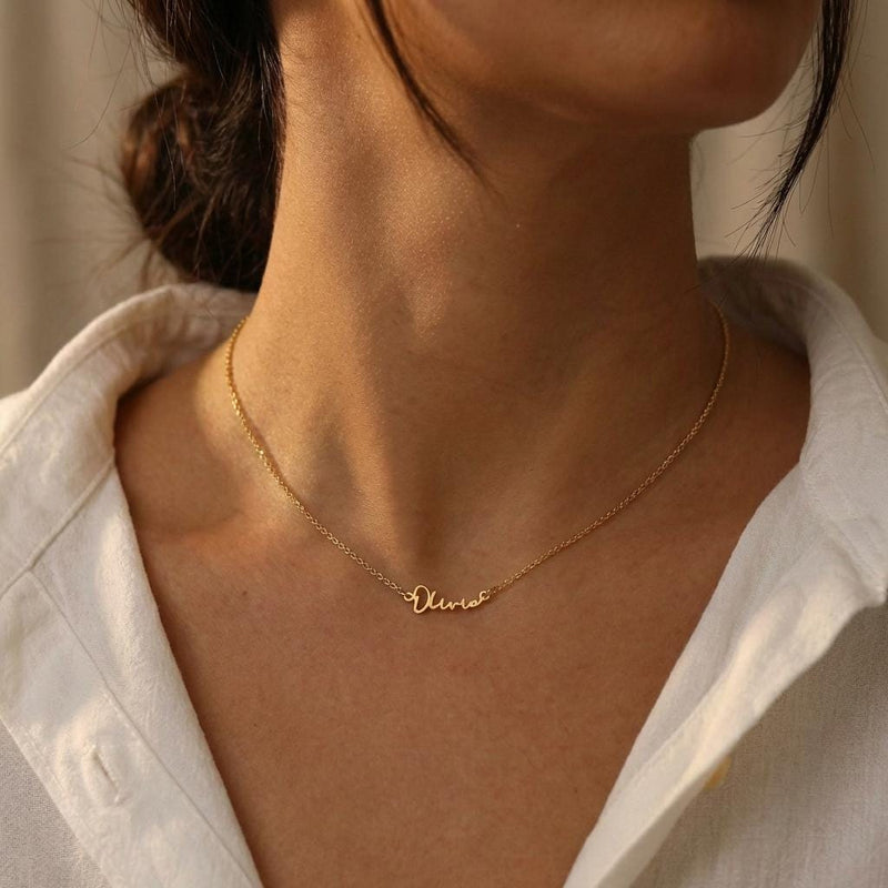 Fine gold cursive script name pendant on a dainty cable chain (4 of 18)