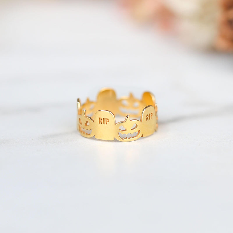 Thin gold stacking ring with a small RIP tombstone charm on the crown (3 of 15)