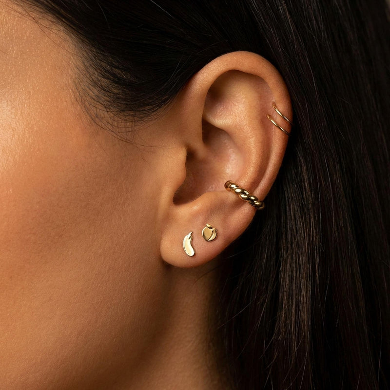 Mismatched pair of tiny gold peach and eggplant emoji stud earrings (14 of 14)
