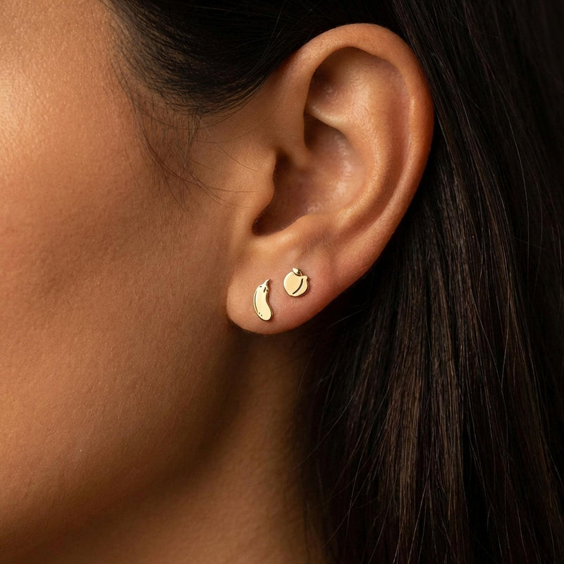 Mismatched pair of tiny gold peach and eggplant emoji stud earrings (3 of 14)