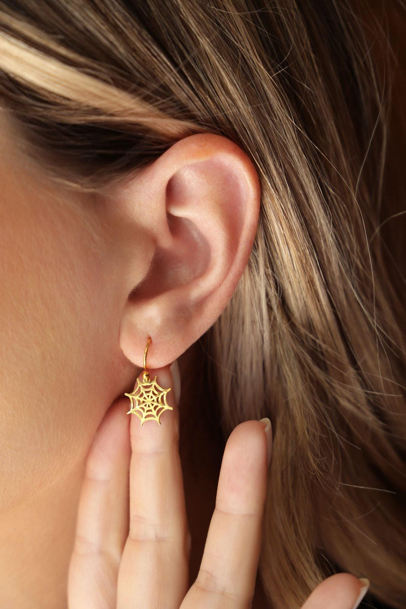 Pair of gold spider web dangle earrings with open line work (2 of 9)