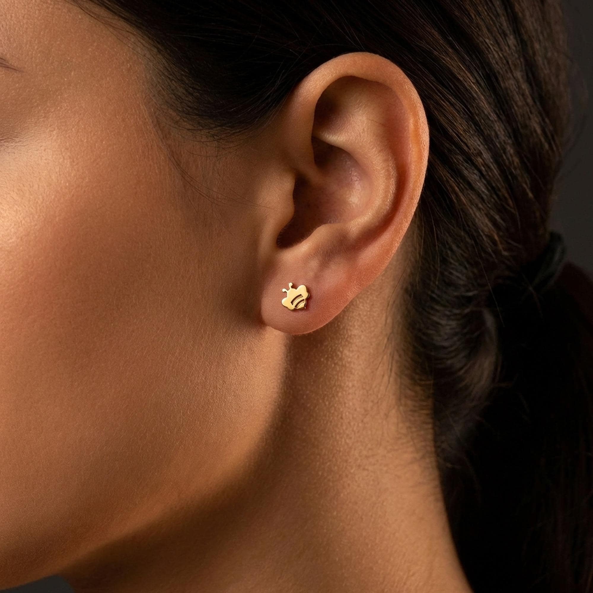 Pair of very small flat bee stud earrings in polished gold (2 of 12)
