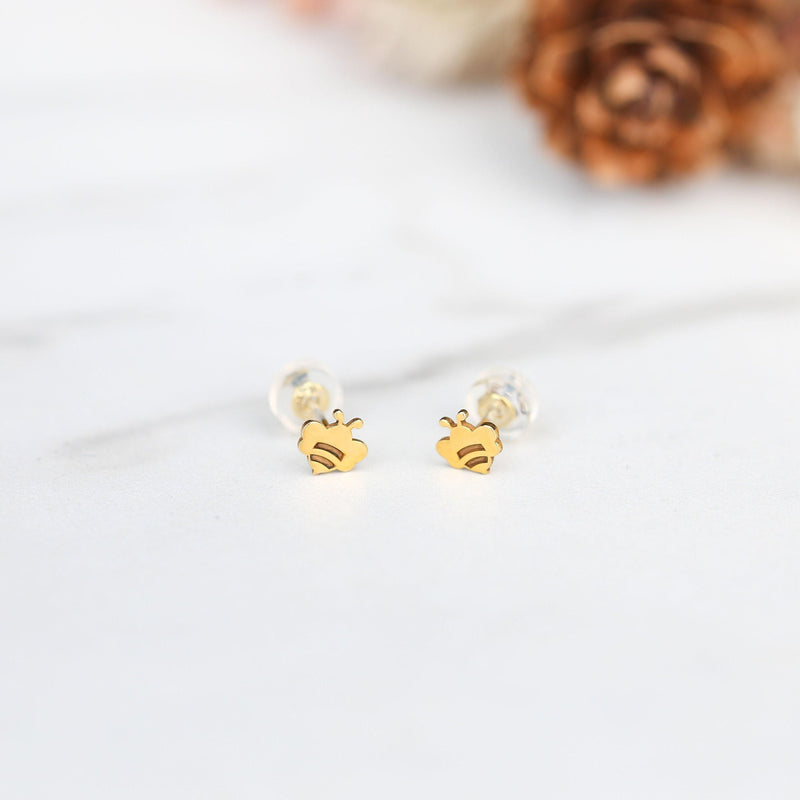 Pair of very small flat bee stud earrings in polished gold (9 of 12)