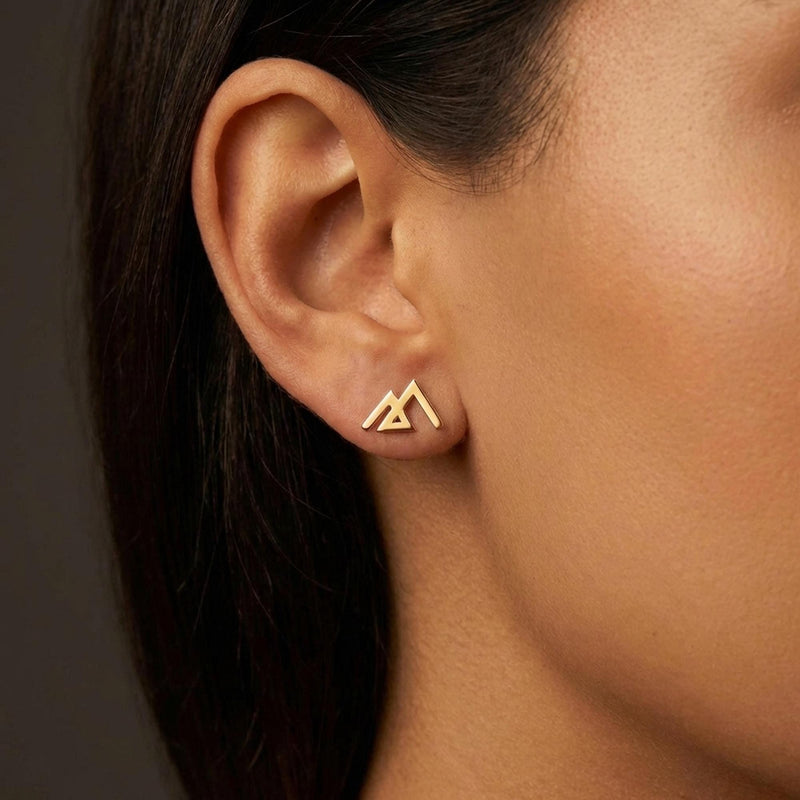 Small gold geometric mountain stud earrings with angular peaks, shown as a pair (13 of 14)
