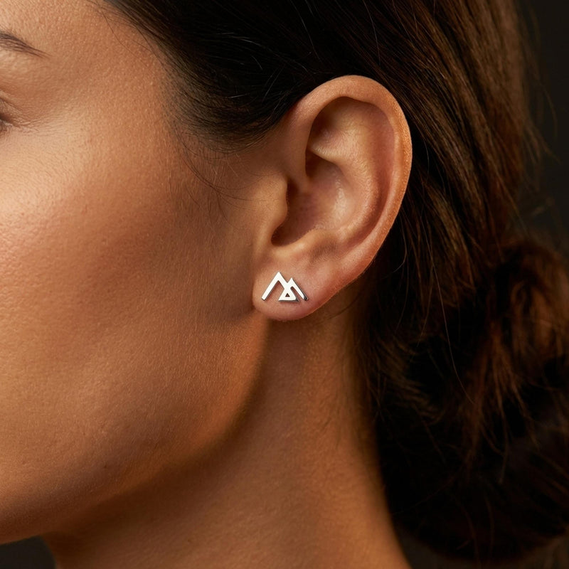 Small gold geometric mountain stud earrings with angular peaks, shown as a pair (14 of 14)