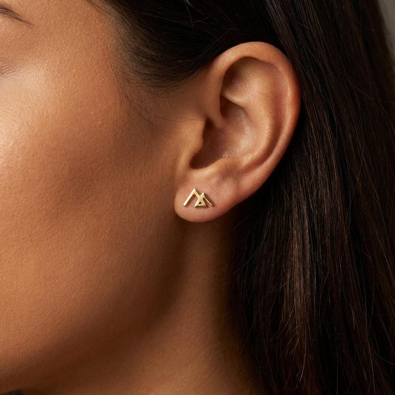 Small gold geometric mountain stud earrings with angular peaks, shown as a pair (7 of 14)