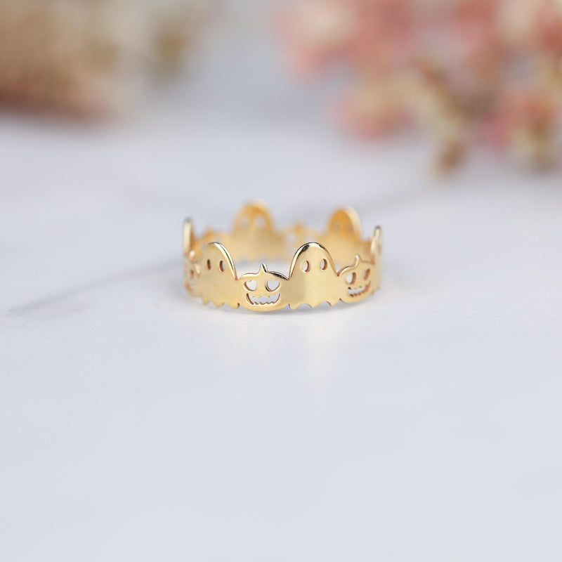 Dainty gold Halloween ring with a small sculpted top on a thin band (9 of 12)