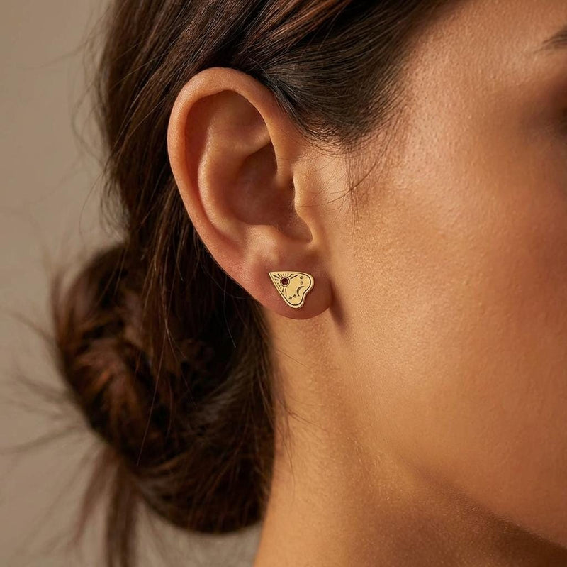 Pair of gold planchette stud earrings with a cut out circular viewing window (2 of 11)
