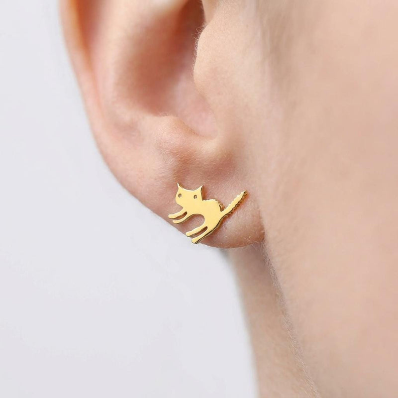 Pair of small gold cat stud earrings showing a seated cat with curled tail (2 of 8)