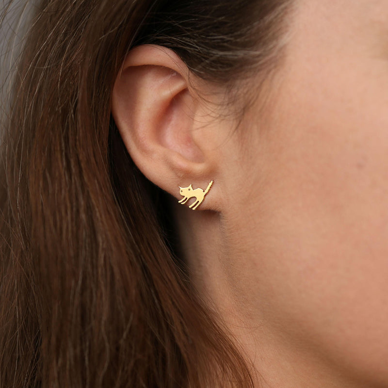 Pair of small gold cat stud earrings showing a seated cat with curled tail (4 of 8)