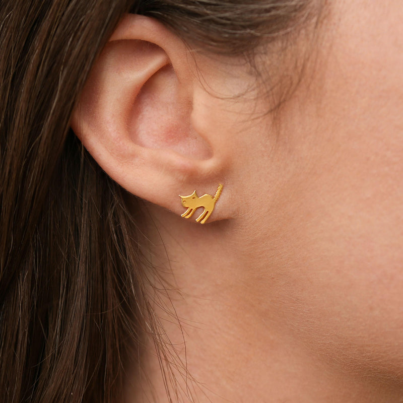 Pair of small gold cat stud earrings showing a seated cat with curled tail (5 of 8)