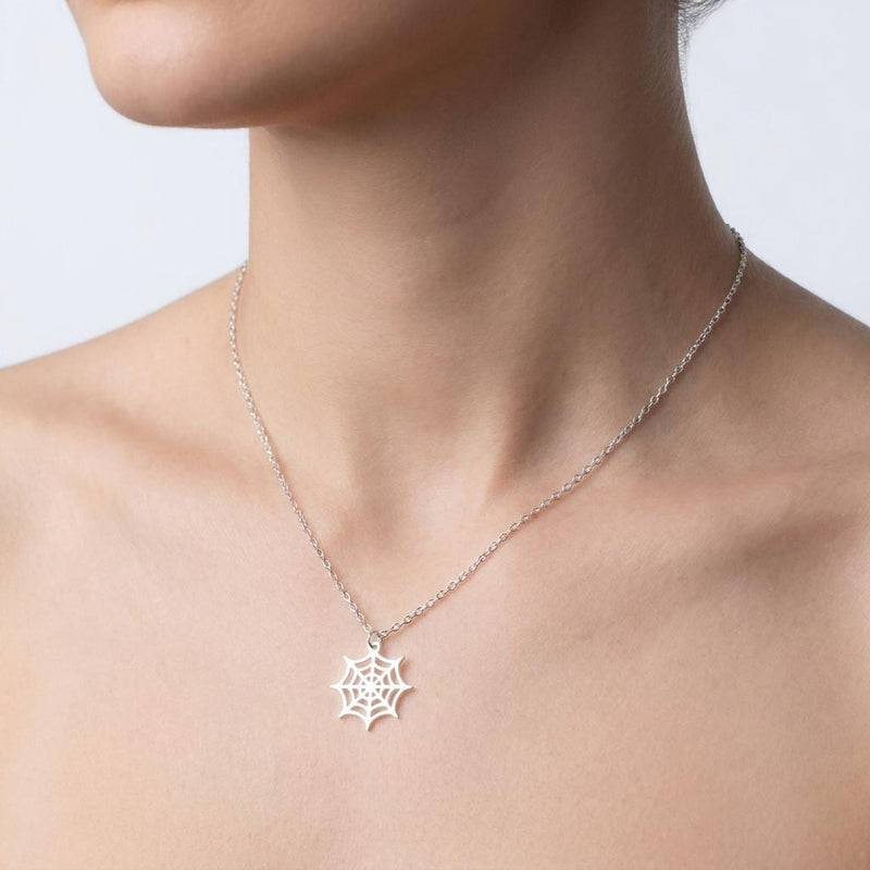 Dainty gold spider web pendant with fine radial threads, hanging from a thin gold-filled cable chain (3 of 13)