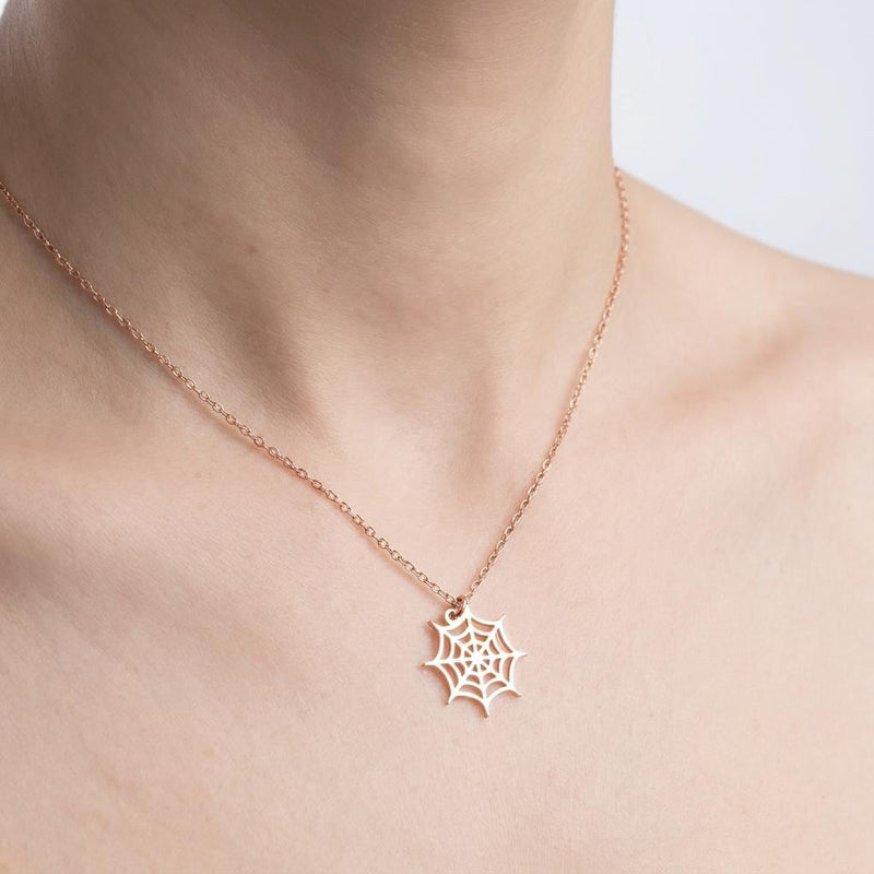 Dainty gold spider web pendant with fine radial threads, hanging from a thin gold-filled cable chain (4 of 13)