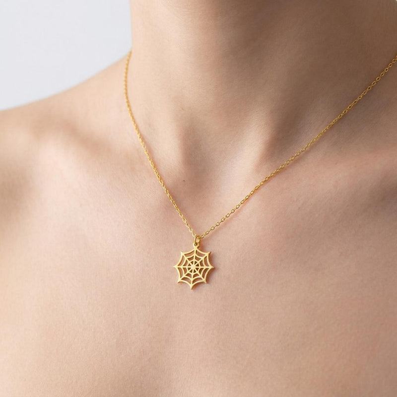 Dainty gold spider web pendant with fine radial threads, hanging from a thin gold-filled cable chain (5 of 13)