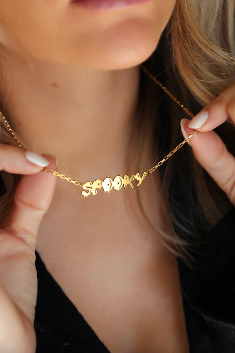 Gold script word pendant reading spooky with connected letters on a fine chain (2 of 10)
