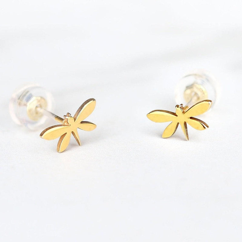 Pair of narrow gold dragonfly stud earrings with four wings, shown front on. (7 of 11)