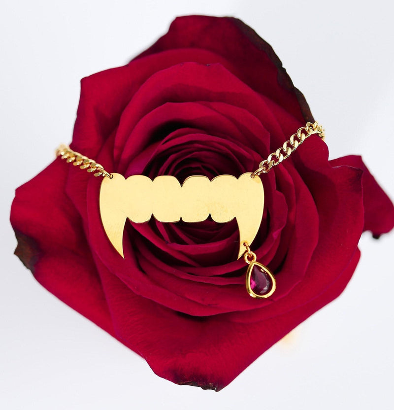 Small silver vampire fang pendant on a fine chain necklace (11 of 11)