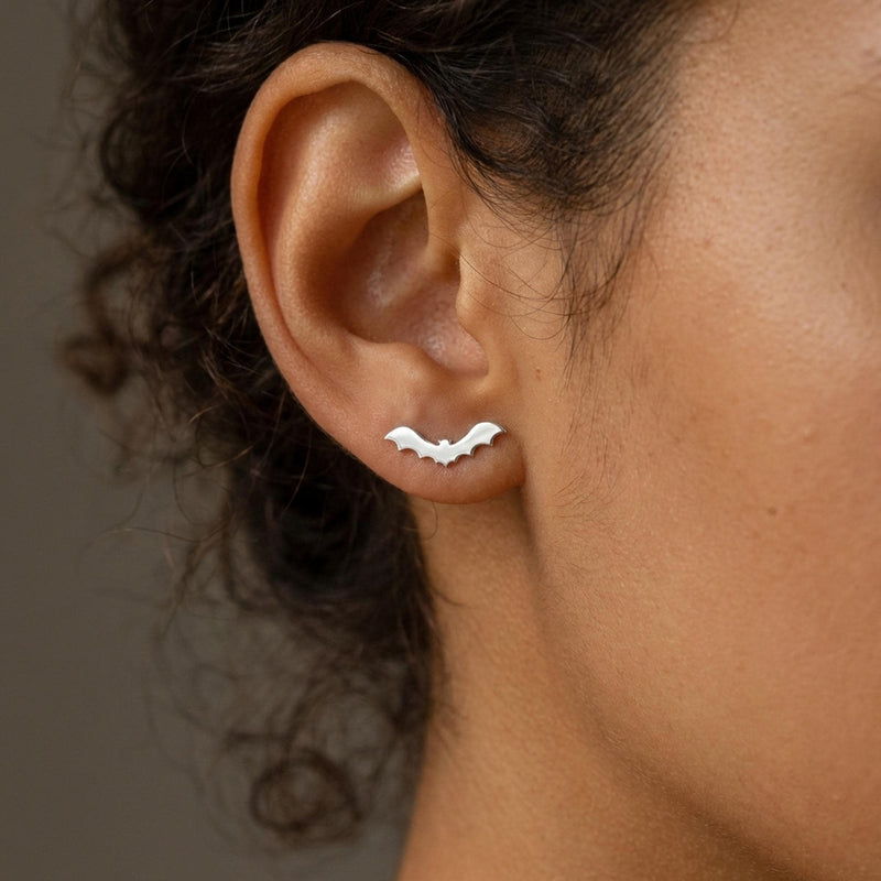 Pair of flat bat stud earrings with outstretched wings, in gold (3 of 10)