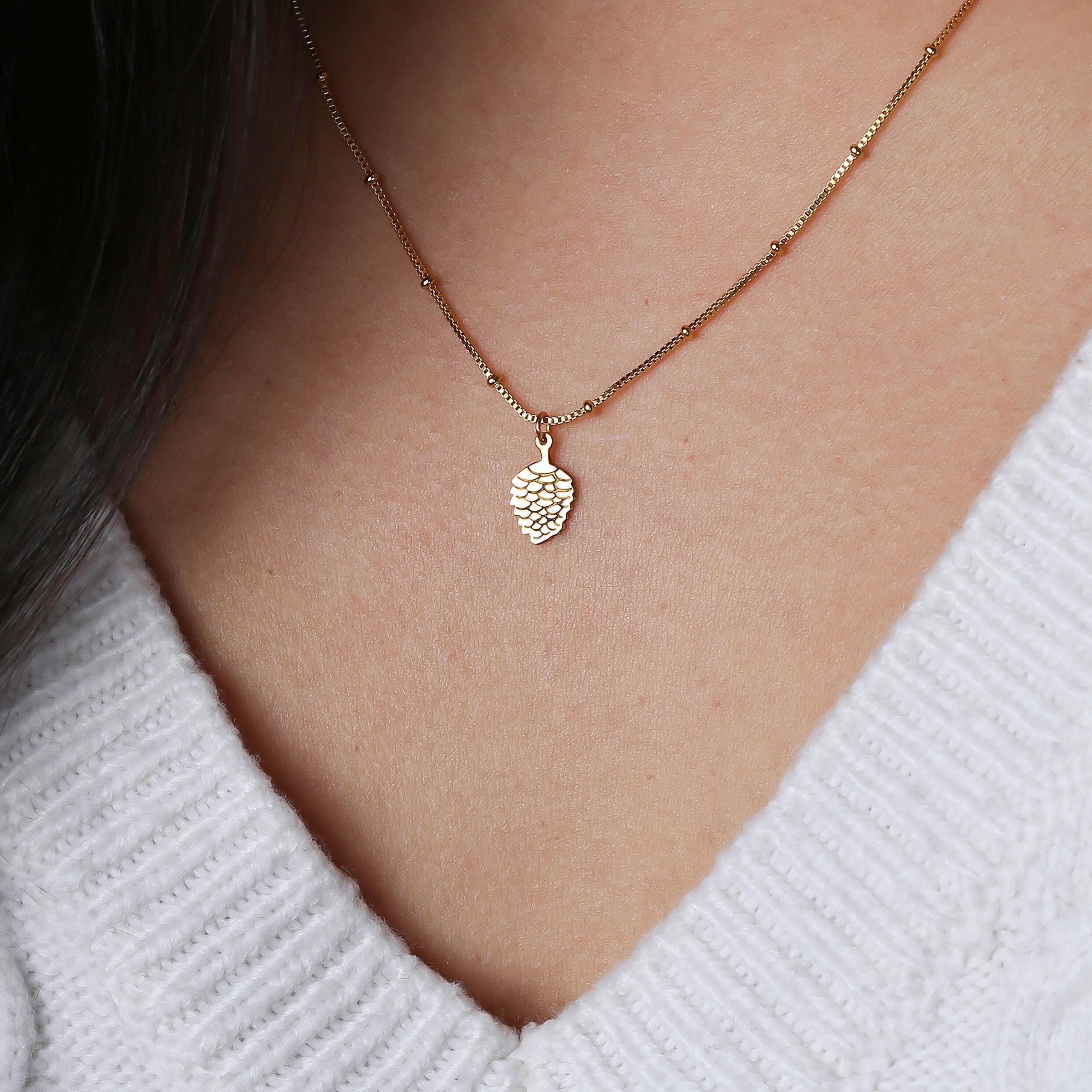 Small gold pinecone pendant with spiraled scales on a fine chain (2 of 9)