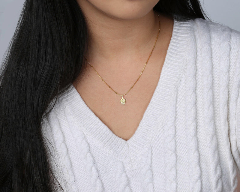 Small gold pinecone pendant with spiraled scales on a fine chain (3 of 9)