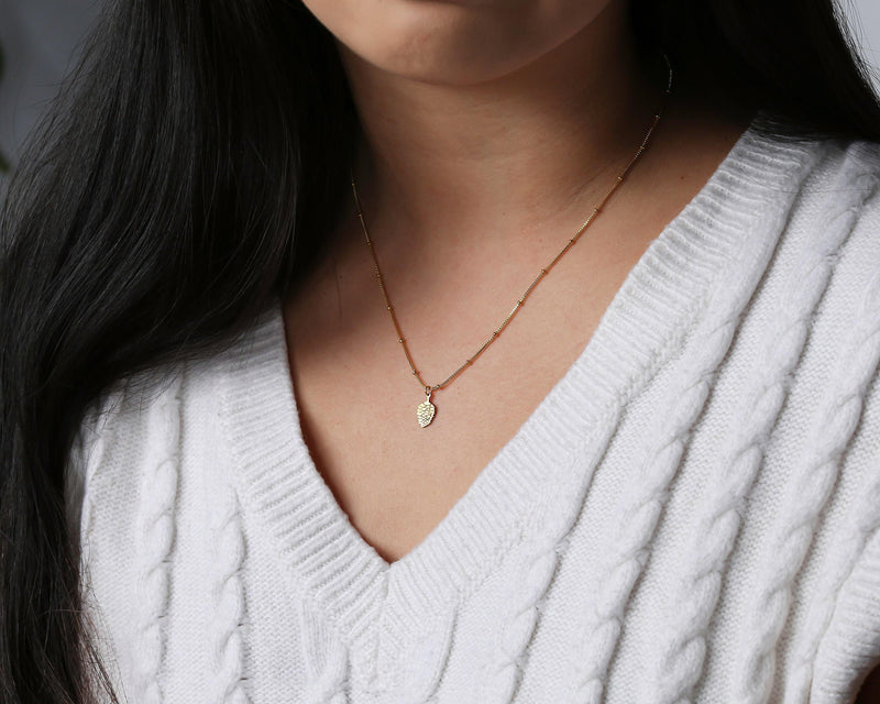 Small gold pinecone pendant with spiraled scales on a fine chain (4 of 9)