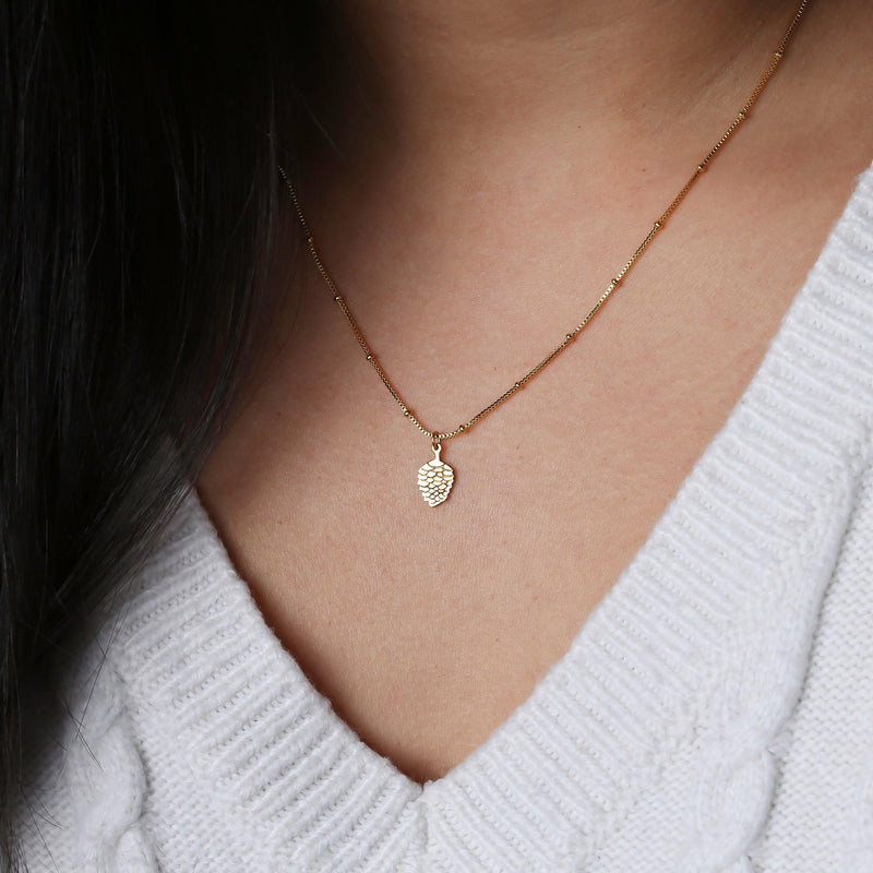 Small gold pinecone pendant with spiraled scales on a fine chain (5 of 9)