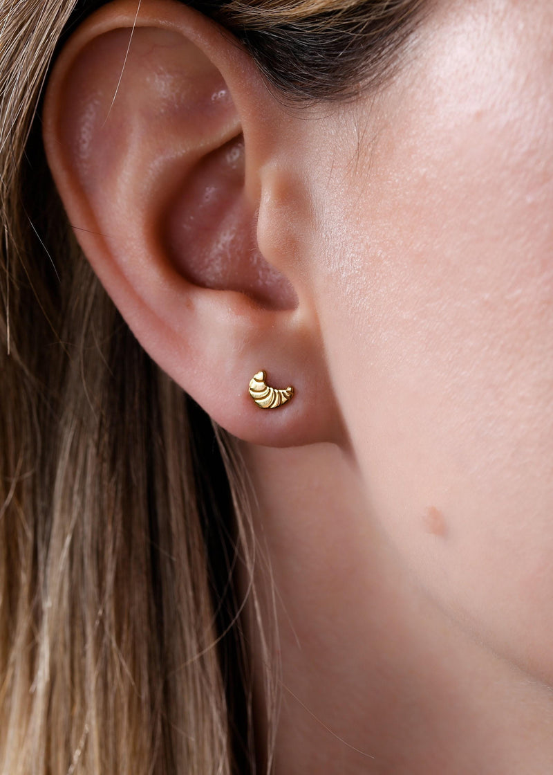 Pair of tiny gold croissant stud earrings with scored curved tops (9 of 9)