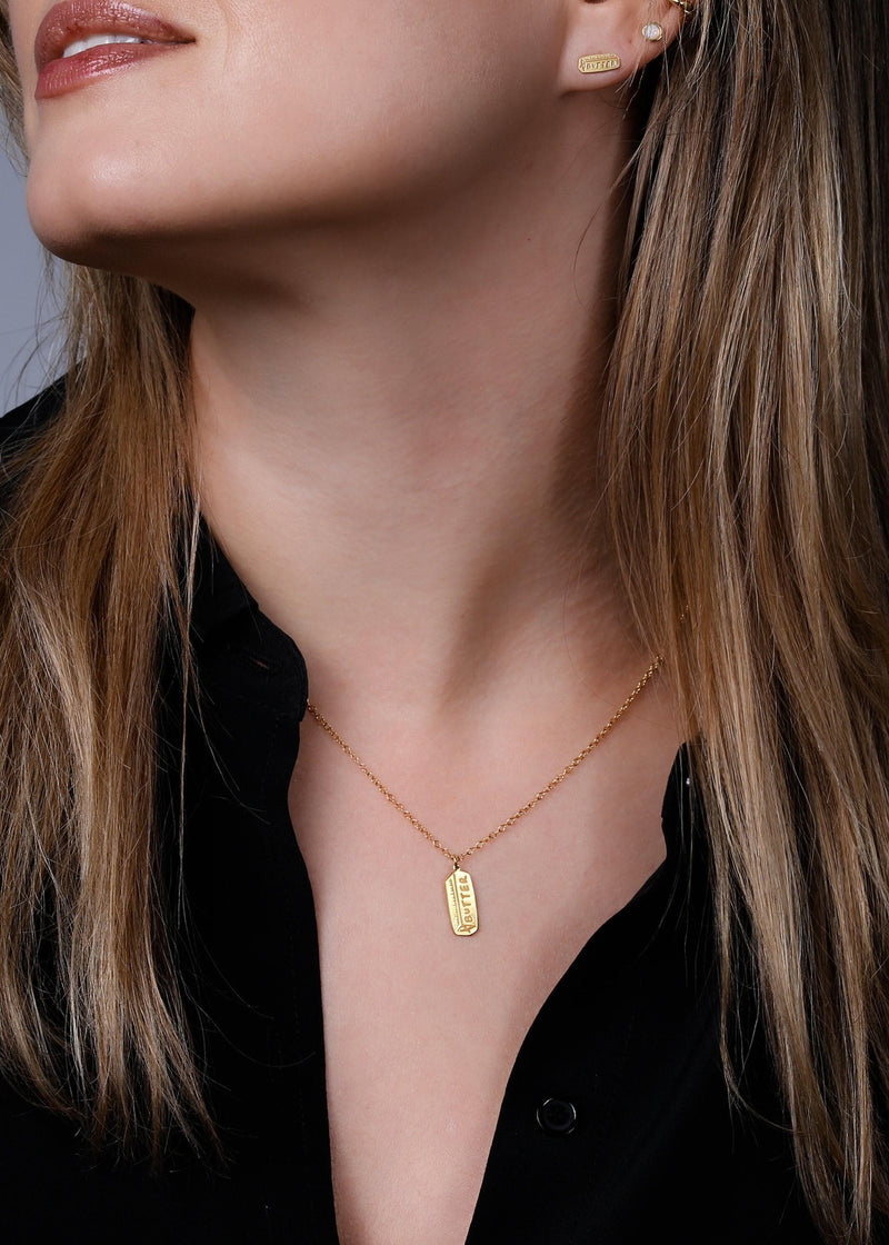 Fine gold chain necklace with a small pendant shaped like a stick of butter (3 of 13)
