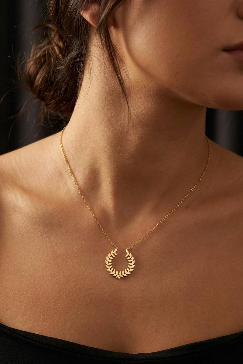 Gold laurel wreath pendant with two leafy branches meeting at the base on a chain (2 of 9)