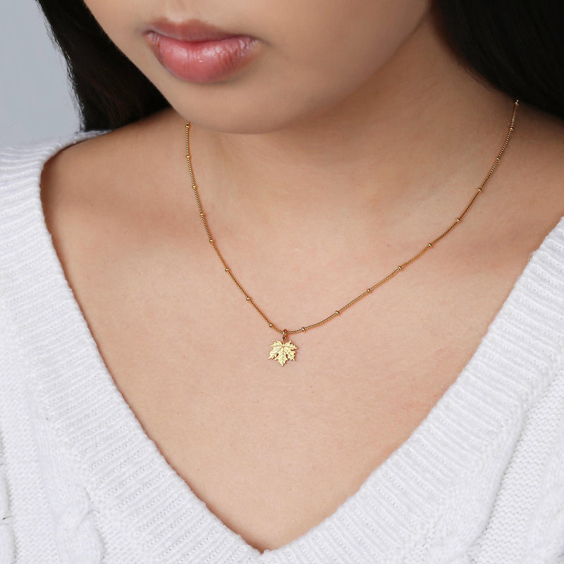 Dainty gold maple leaf pendant on a fine cable chain (4 of 12)