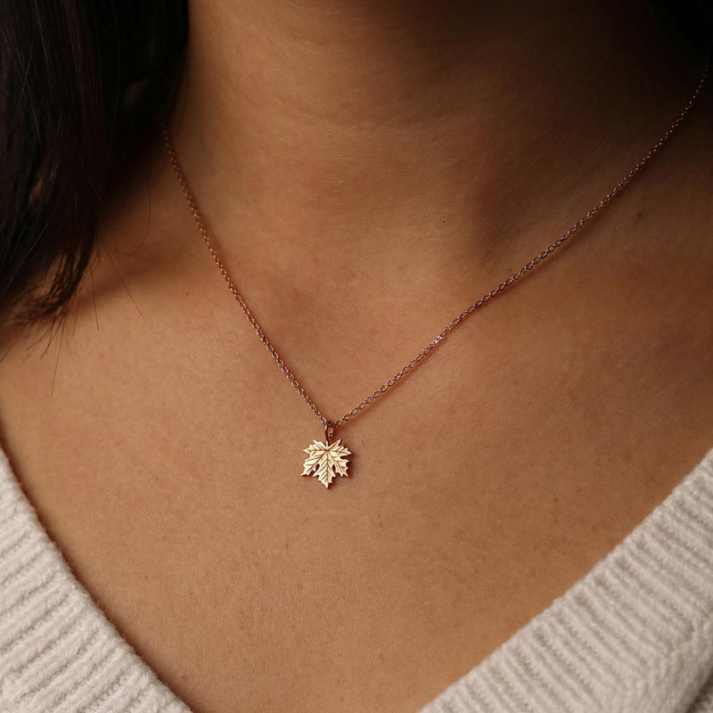 Dainty gold maple leaf pendant on a fine cable chain (8 of 12)