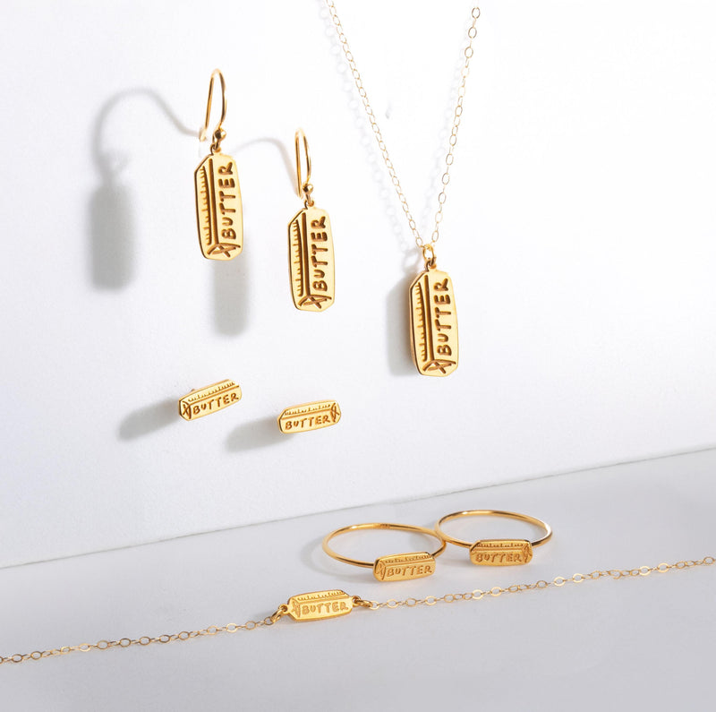 Pair of small gold stick of butter stud earrings with wrapper detail (11 of 16)