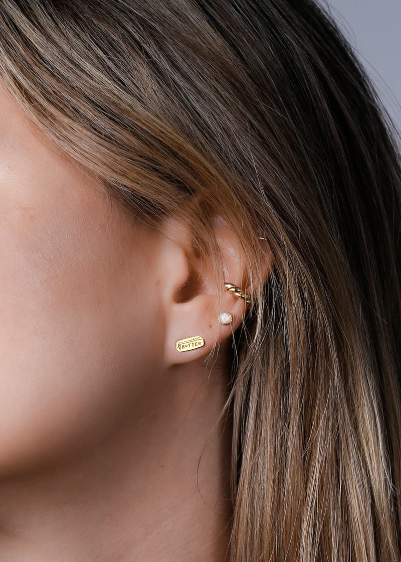 Pair of small gold stick of butter stud earrings with wrapper detail (9 of 16)