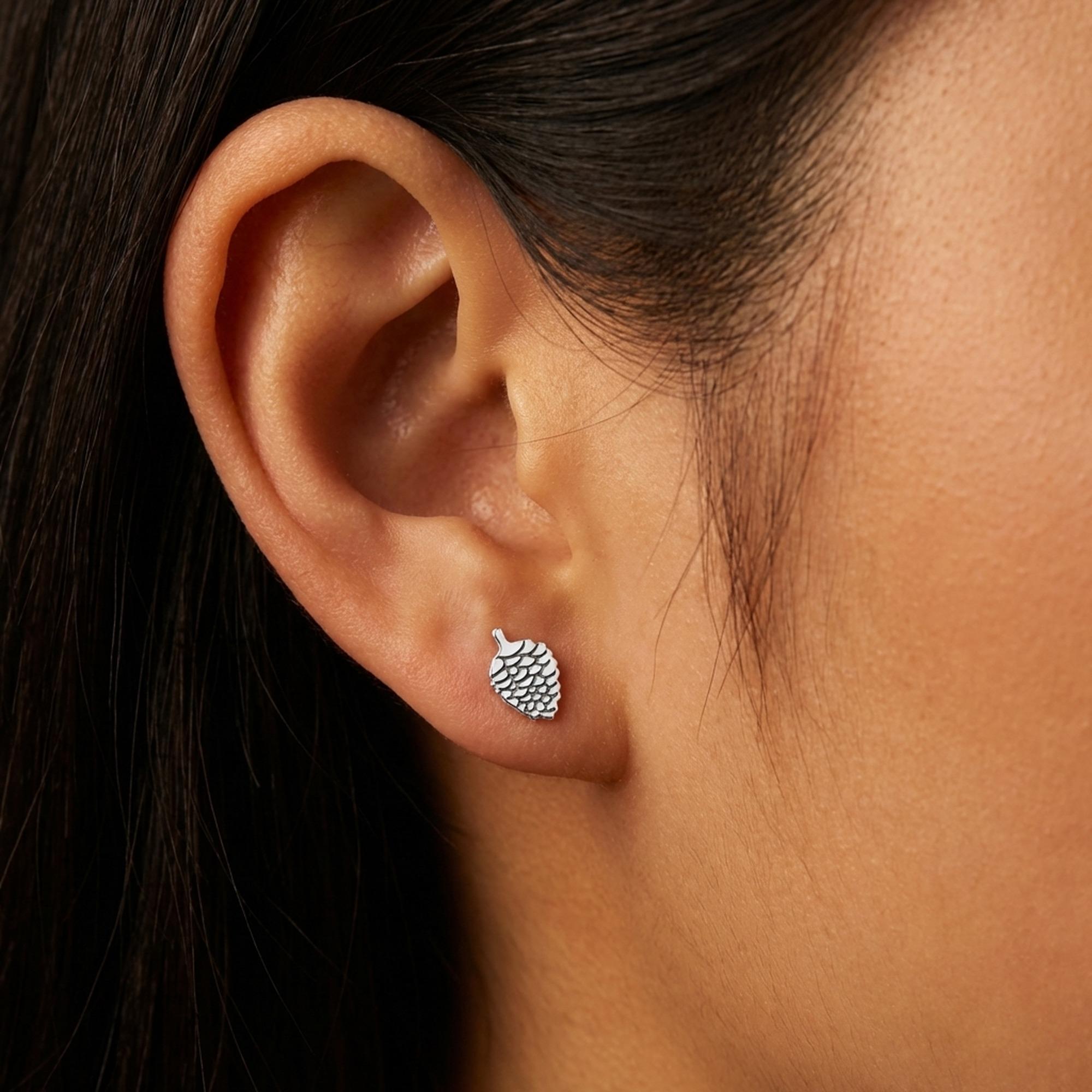 Pair of small textured pinecone stud earrings in gold, shown front-on (2 of 7)
