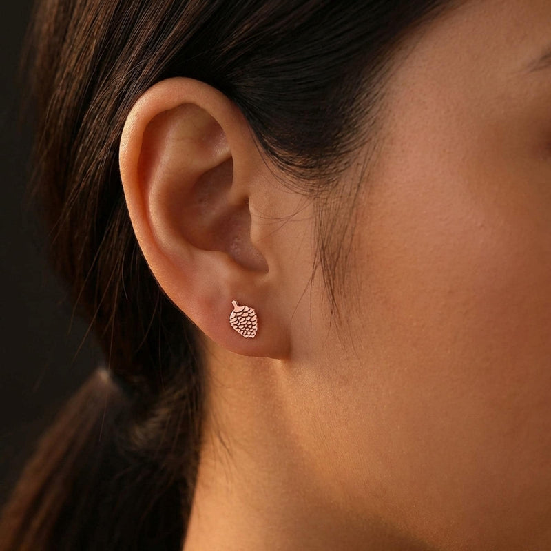Pair of small textured pinecone stud earrings in gold, shown front-on (3 of 7)
