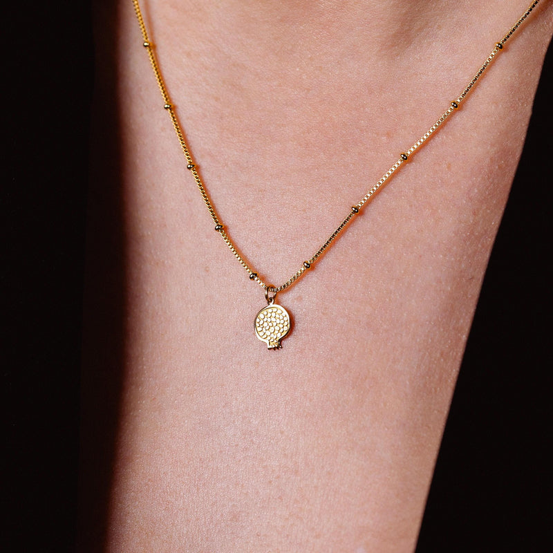 Gold cut pomegranate pendant showing seeds, on a fine cable chain (2 of 9)