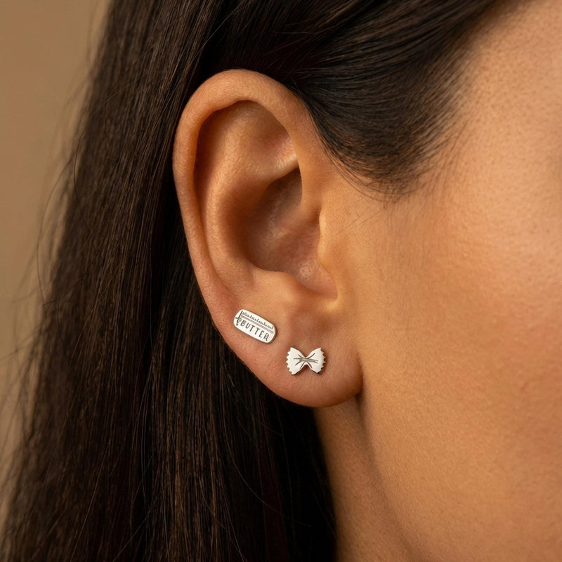 Mismatched gold stud earrings, a butter pat and a pasta twist (12 of 12)