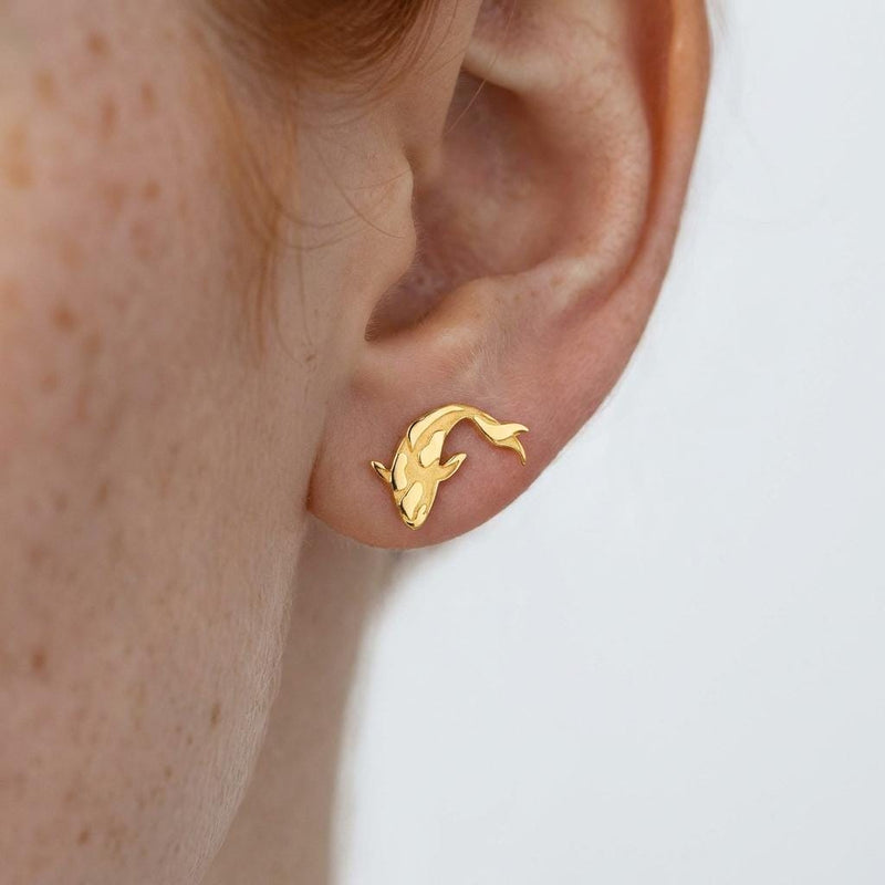 Pair of small gold koi fish stud earrings with fanned fins, white background. (2 of 7)
