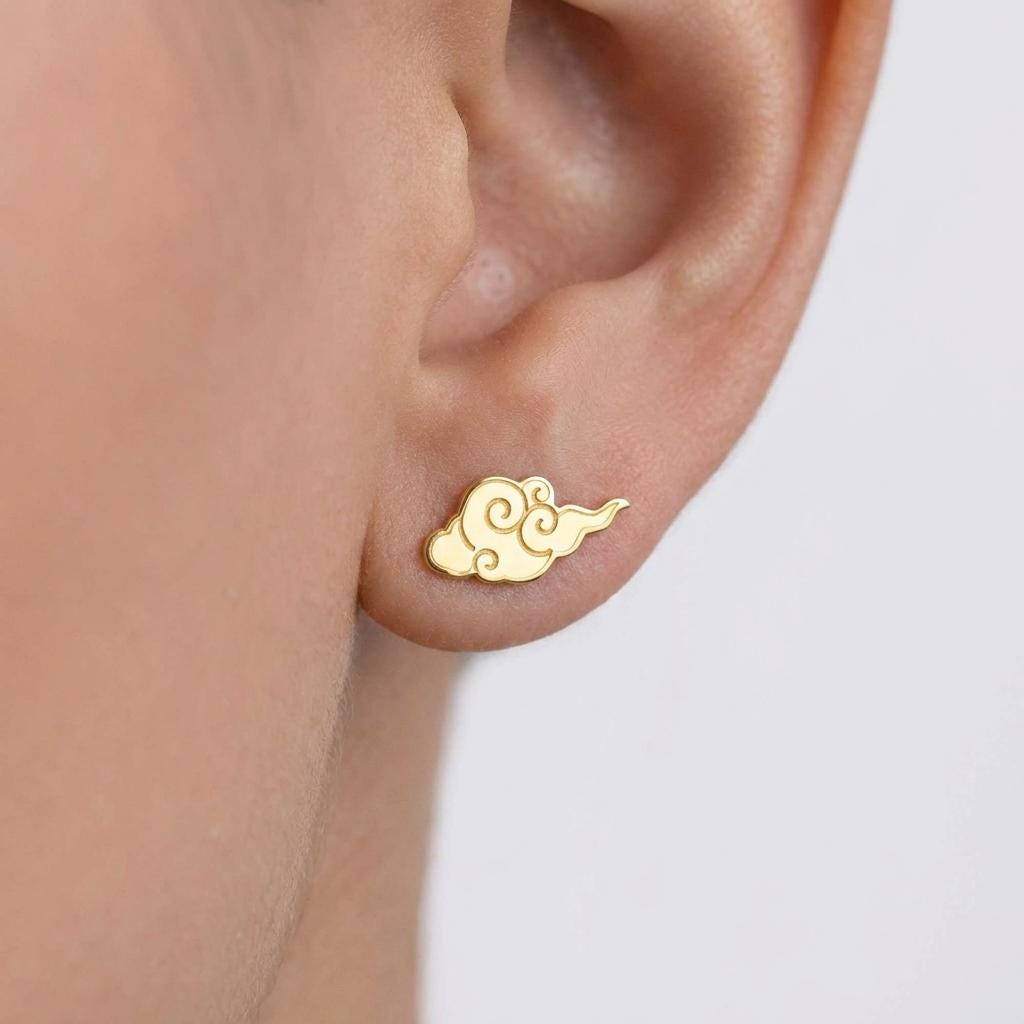 Pair of gold auspicious cloud stud earrings with curled scroll shape