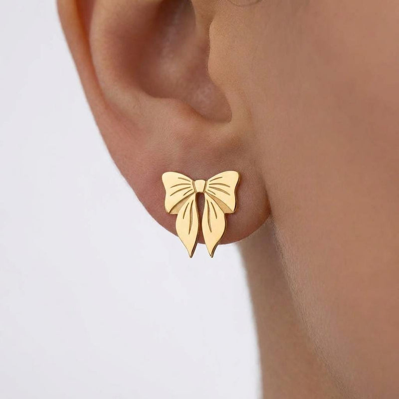 Pair of small ribbon bow stud earrings in gold with two loops and short tails (2 of 10)