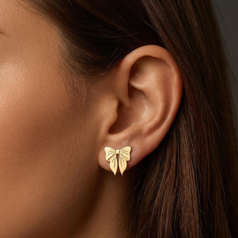 Pair of small ribbon bow stud earrings in gold with two loops and short tails (3 of 10)