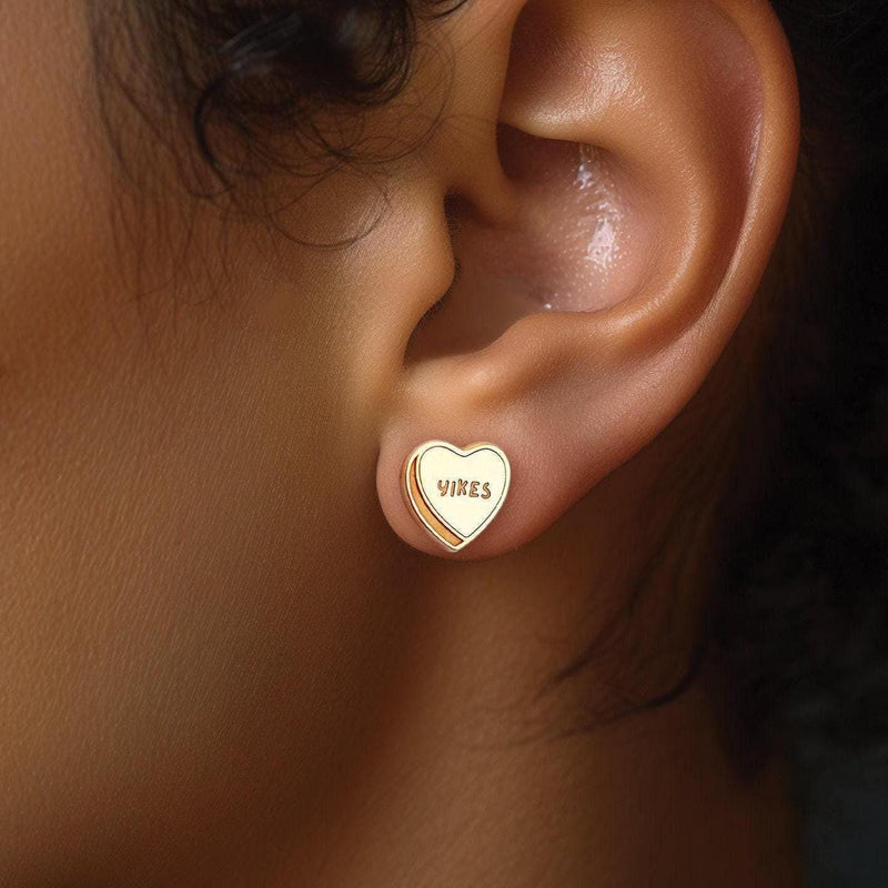 Pair of tiny candy conversation heart stud earrings in polished gold