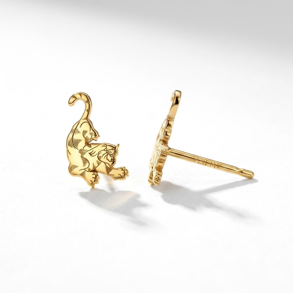 Pair of gold tiger stud earrings shown in profile with stripe detail (2 of 10)