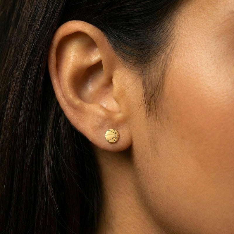 Pair of round gold basketball stud earrings with cut seam lines (3 of 11)