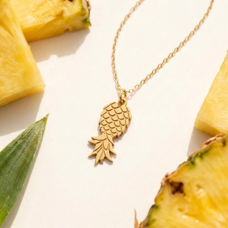 Upside Down Pineapple Necklace, 24k gold vermeil, photographed on white