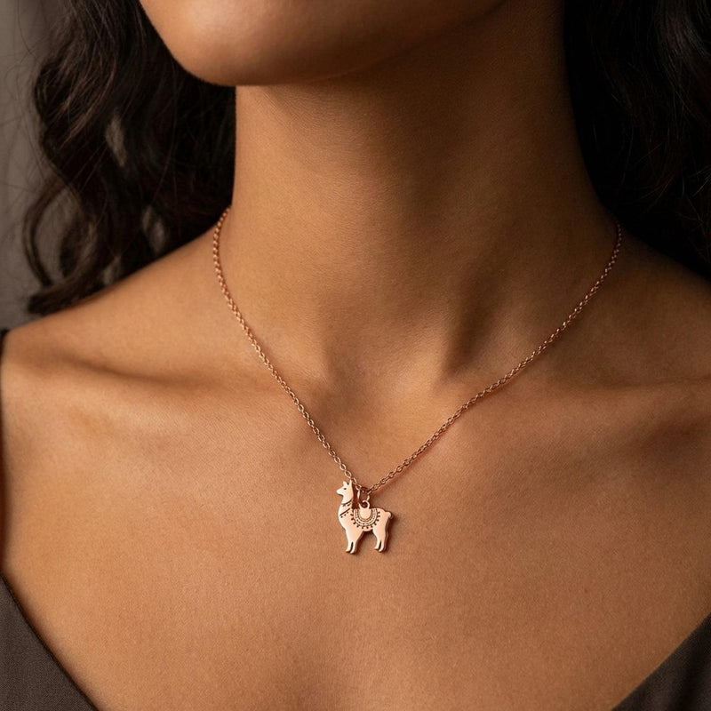 Dainty gold llama pendant with saddle blanket detail on a fine chain (5 of 15)