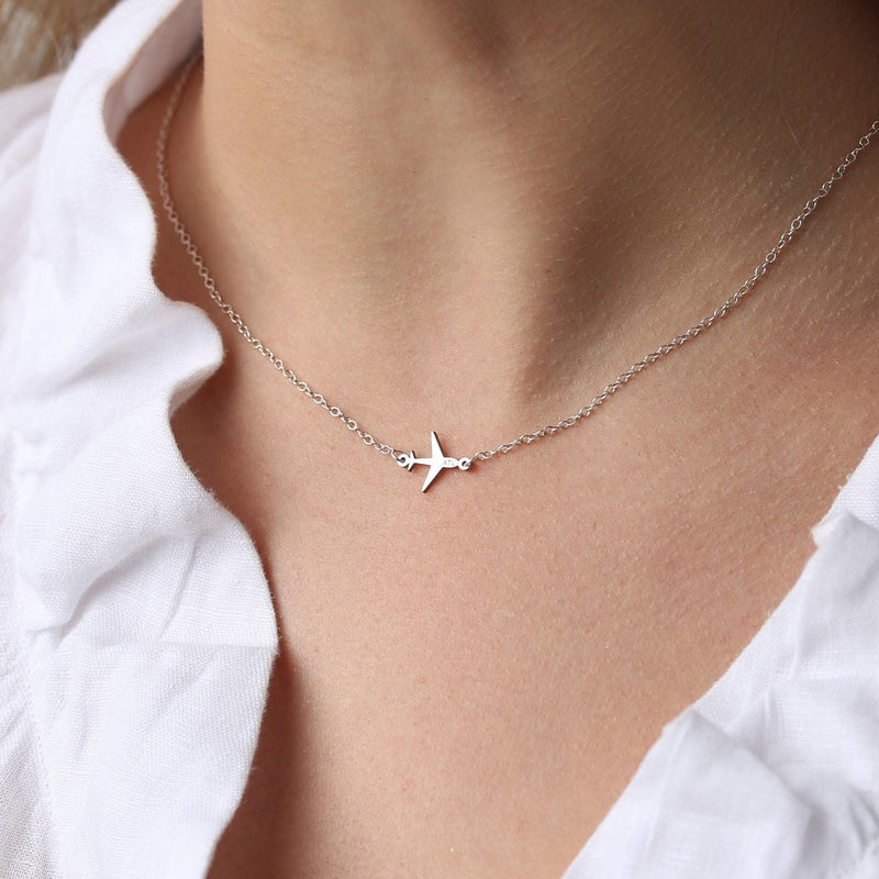 Small gold airplane pendant on a fine cable chain necklace (4 of 9)